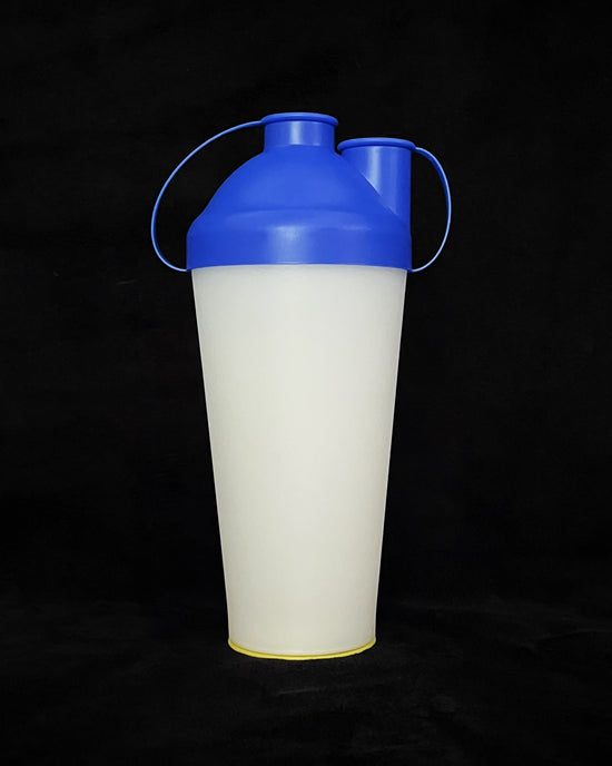 The final ProSeed cup version with a blue lid